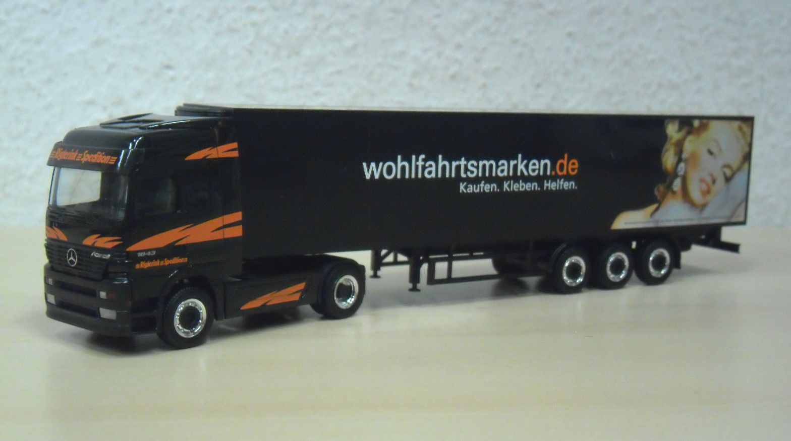 Herpa MB Actros `96 LH "Rigterink Sped./Wohlfahrtsmarken" 